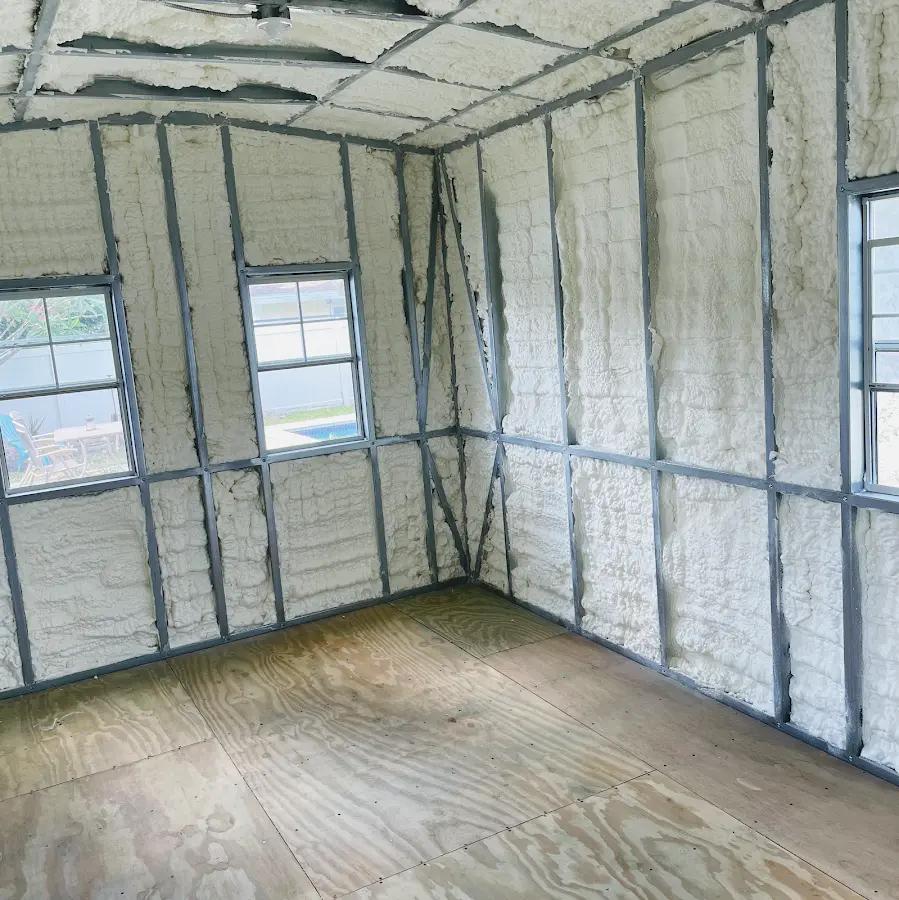 Closed-cell spray foam insulation applied to wall cavities in a residential project in Powder Springs